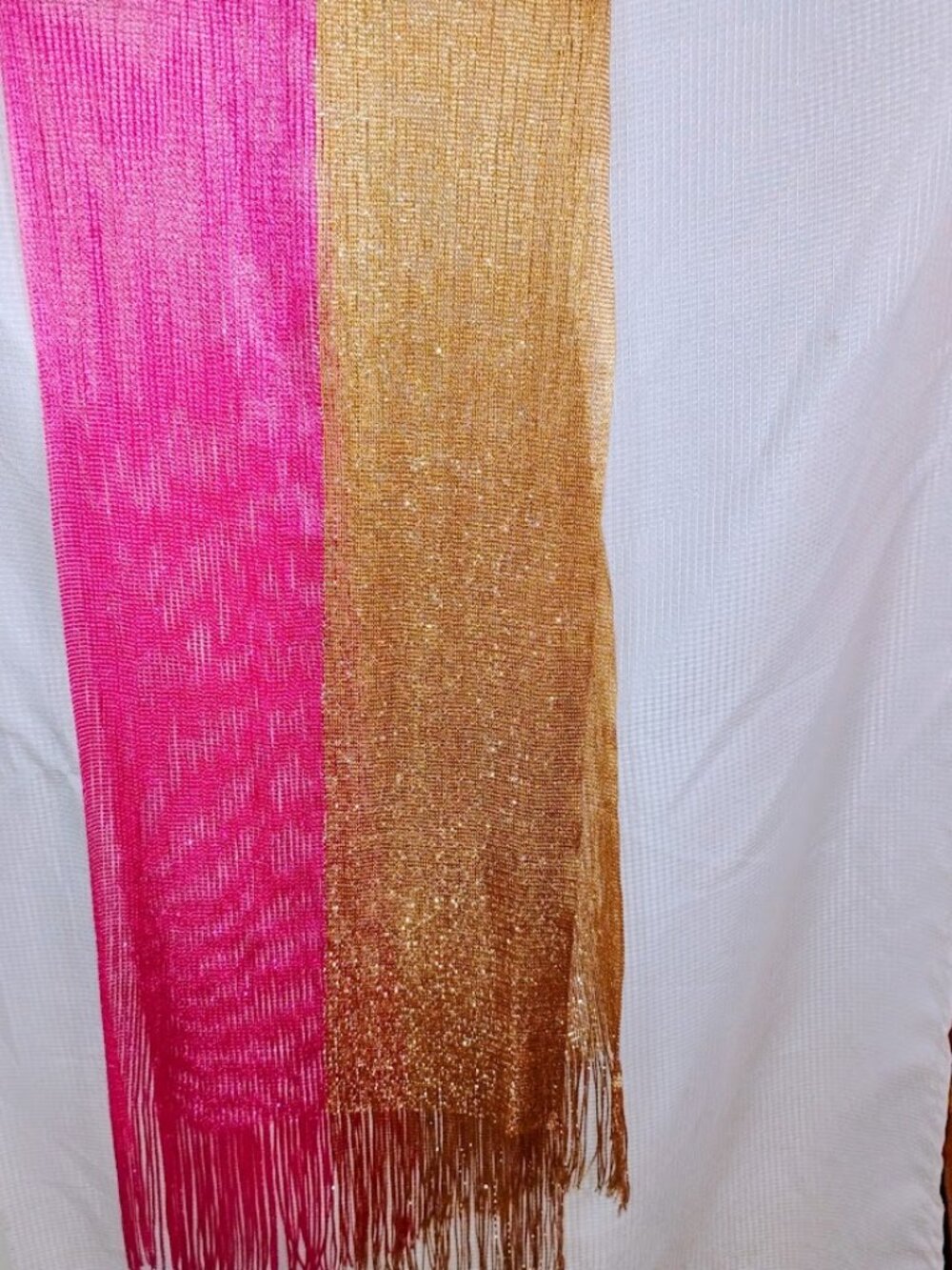 A retro approx 20" x 65" semi-sheer metallic accent piece